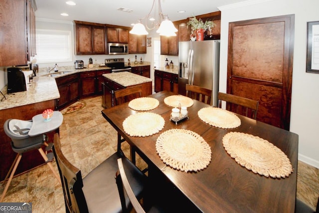 dining room with recessed lighting, visible vents, and crown molding