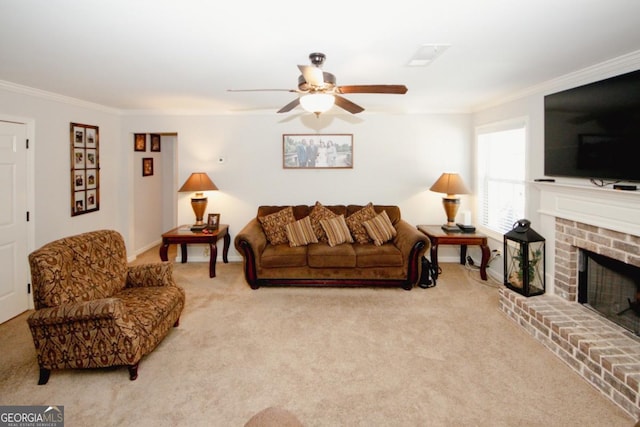 living room with light carpet, ceiling fan, ornamental molding, and a fireplace