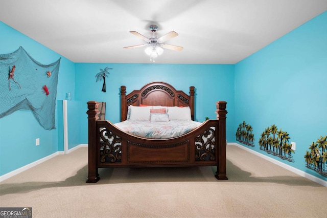 bedroom featuring light carpet, baseboards, and a ceiling fan