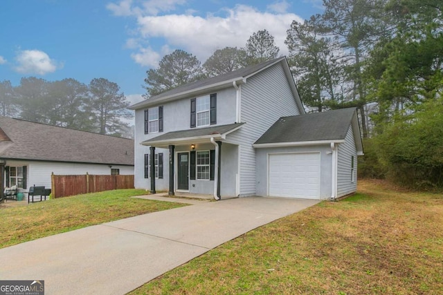 view of front of house featuring an attached garage, fence, concrete driveway, and a front yard