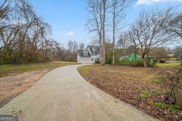 view of street featuring driveway