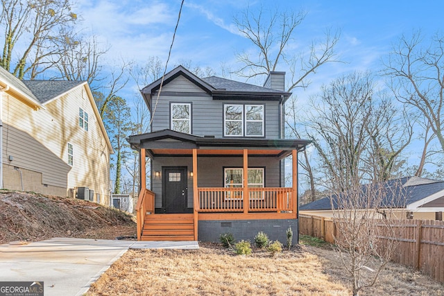 view of front of house featuring a chimney, roof with shingles, crawl space, fence, and a porch