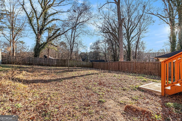 view of yard with a fenced backyard