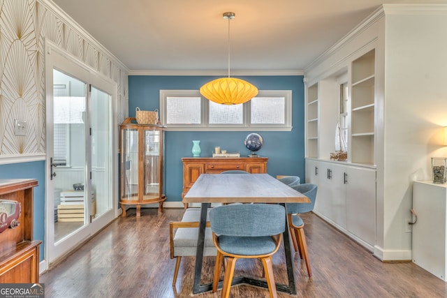 dining room featuring dark wood-style floors, a wealth of natural light, and crown molding