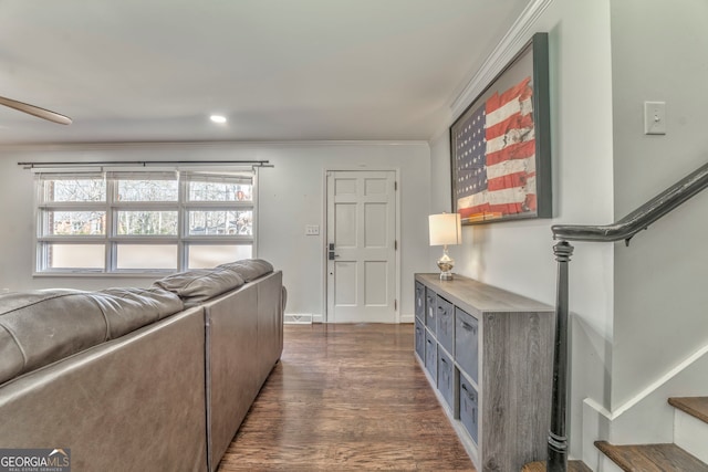 living area with dark wood-style floors, visible vents, stairway, ornamental molding, and baseboards