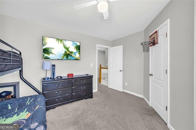 bedroom with carpet, baseboards, and ceiling fan