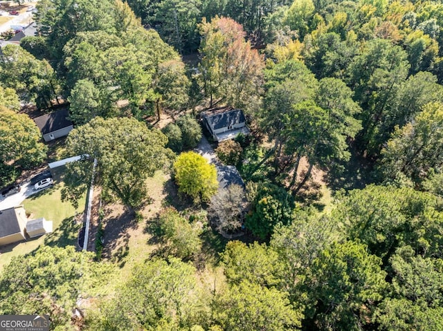 bird's eye view with a view of trees