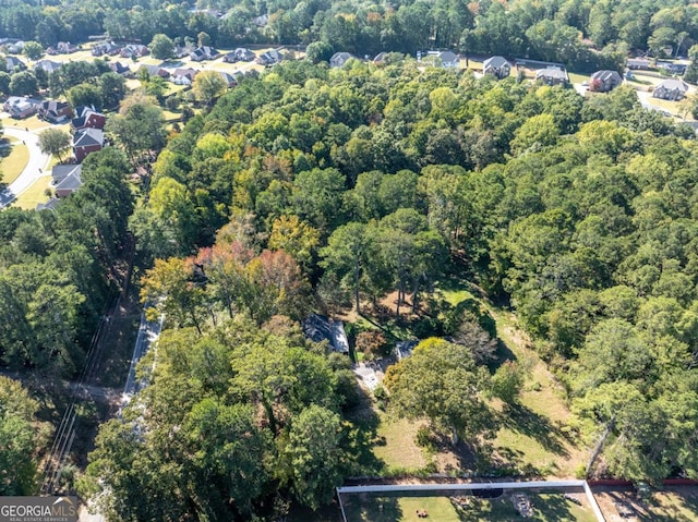 bird's eye view with a view of trees