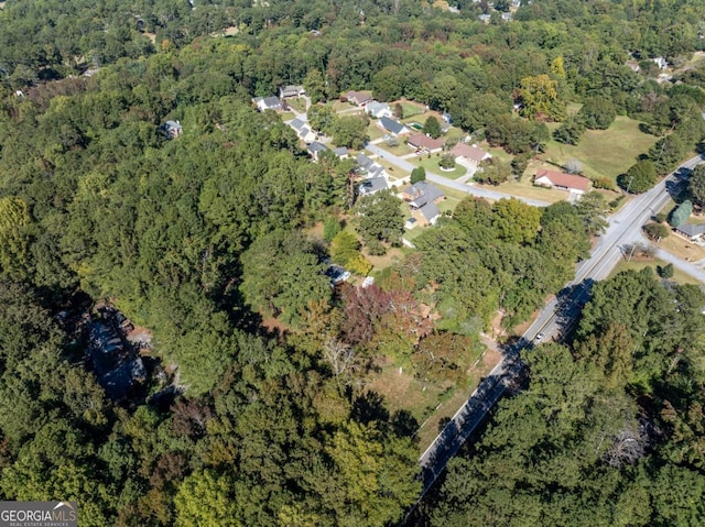 bird's eye view with a view of trees