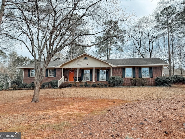 ranch-style home with brick siding