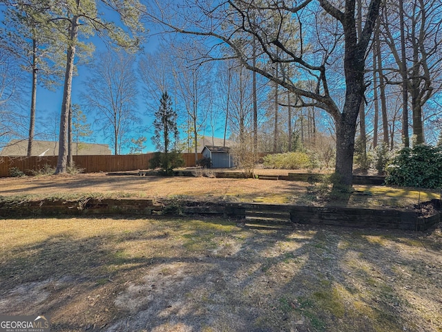 view of yard with fence