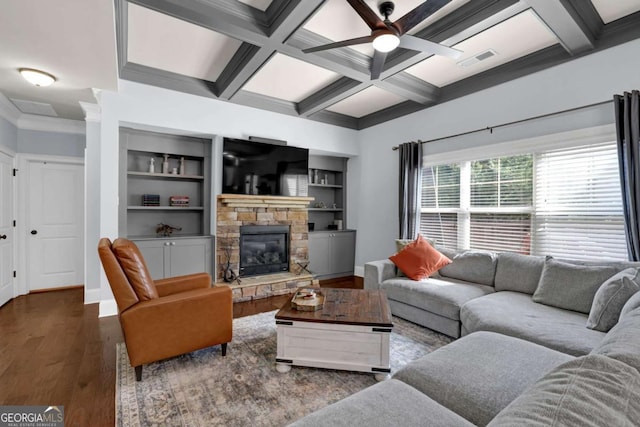 living room with a fireplace, coffered ceiling, visible vents, baseboards, and dark wood finished floors