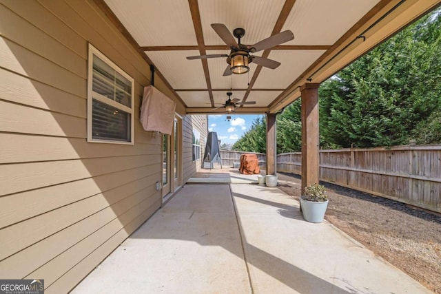 view of patio / terrace with a fenced backyard and a ceiling fan