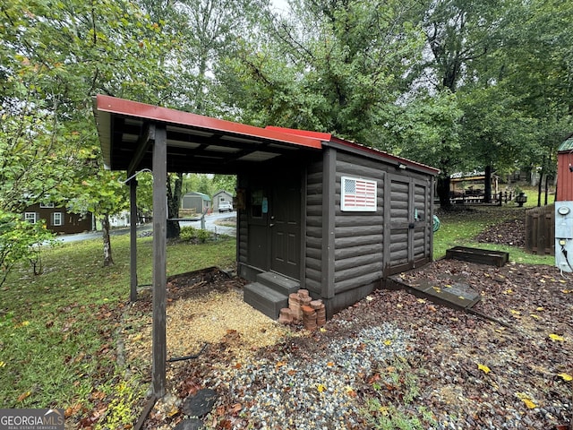 view of outbuilding with entry steps