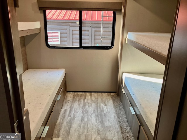 bathroom with wood finished floors