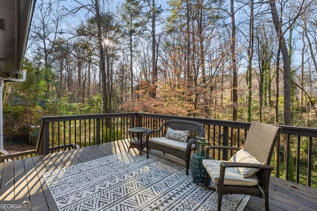 wooden deck with outdoor lounge area