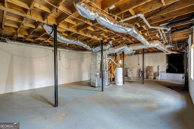 unfinished basement with water heater and heating unit