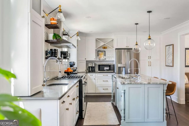 kitchen featuring open shelves, white cabinetry, stainless steel appliances, and decorative backsplash