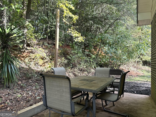 view of patio with outdoor dining area