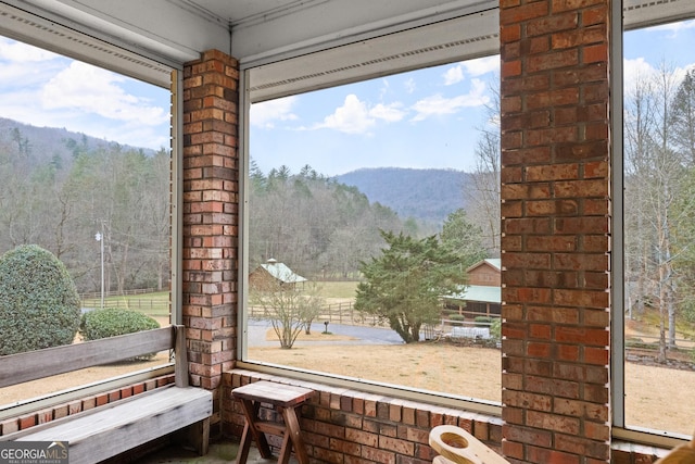 interior space featuring a mountain view and a forest view