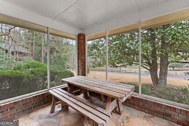 sunroom featuring a healthy amount of sunlight