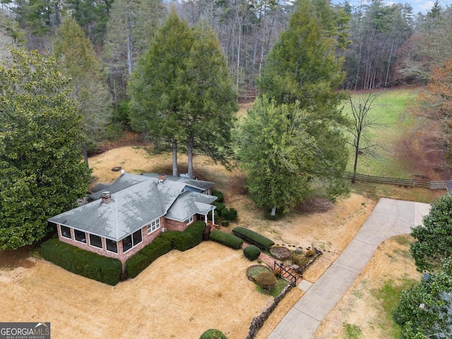 aerial view featuring a view of trees