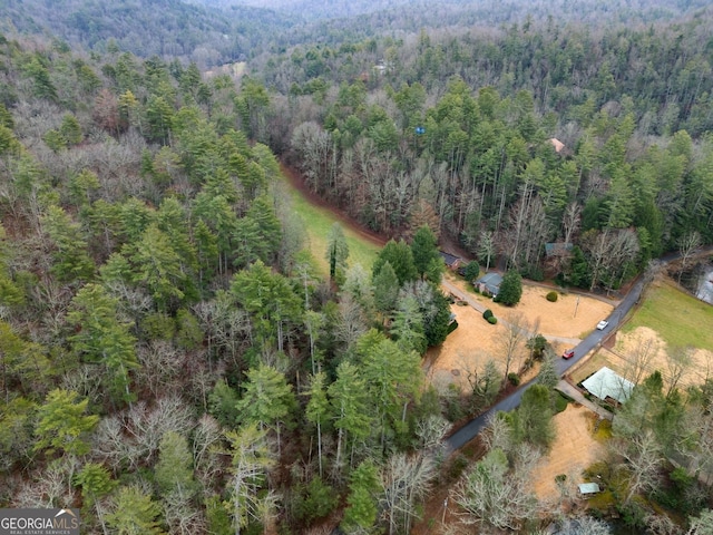 aerial view with a wooded view