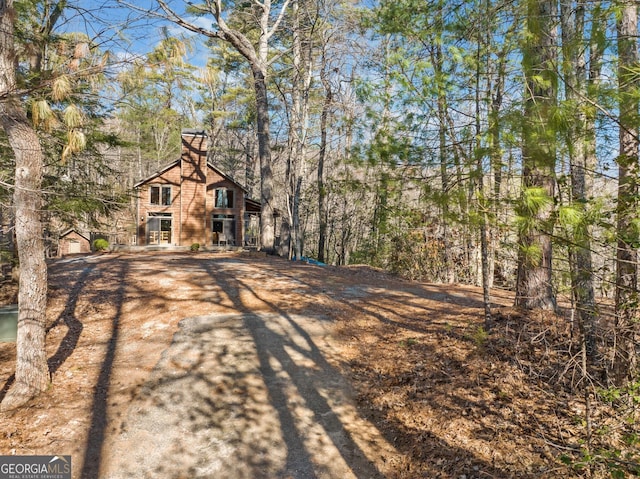 view of front of property featuring a chimney