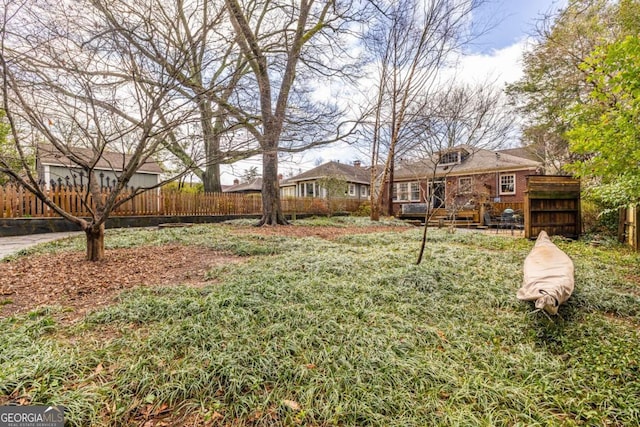 view of yard with fence