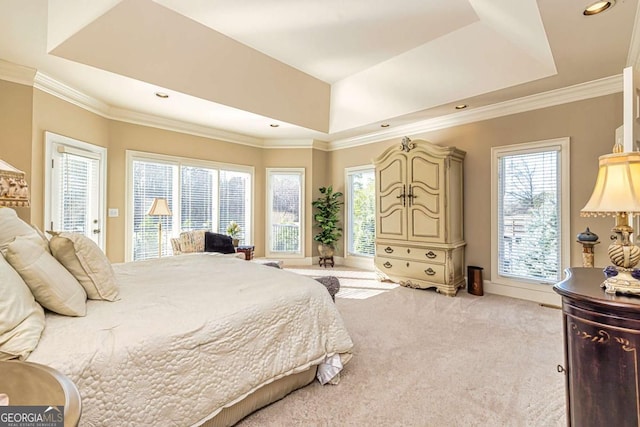 carpeted bedroom with ornamental molding, access to outside, a raised ceiling, and recessed lighting