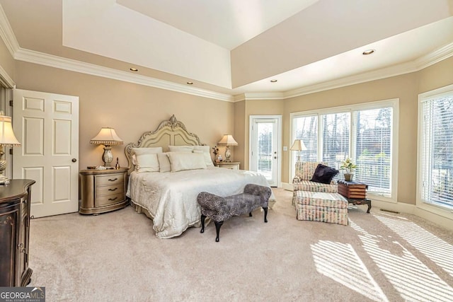 bedroom with access to exterior, ornamental molding, a raised ceiling, and light colored carpet