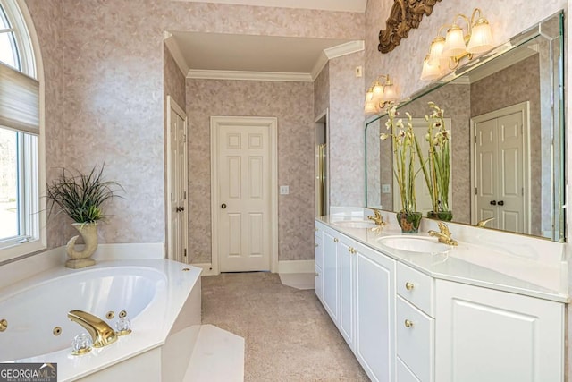 full bathroom with a jetted tub, wallpapered walls, crown molding, and a sink