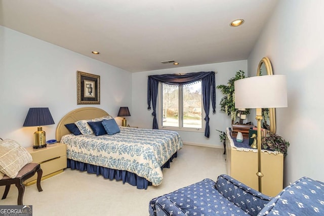 carpeted bedroom with baseboards, visible vents, and recessed lighting