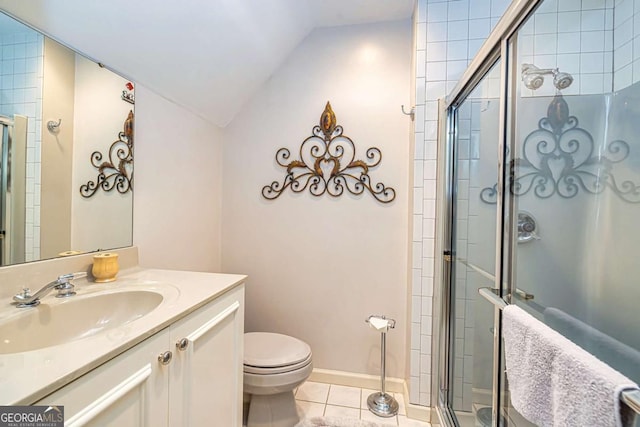 full bath with a stall shower, tile patterned flooring, vaulted ceiling, and toilet