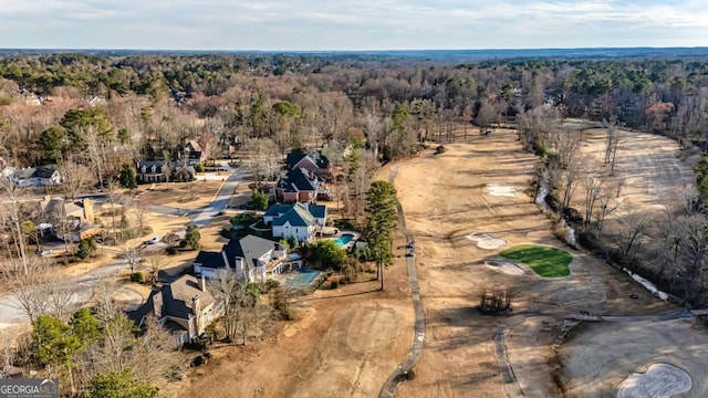 aerial view featuring a forest view