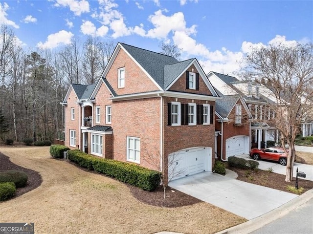 view of property exterior featuring a garage, concrete driveway, and brick siding