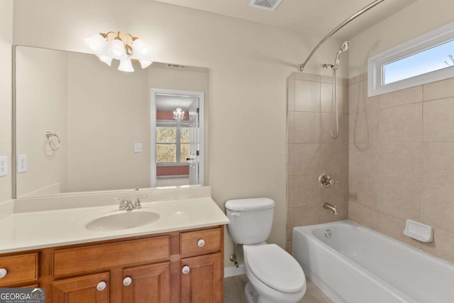 full bath featuring  shower combination, plenty of natural light, vanity, and toilet