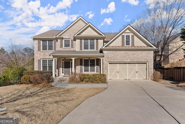 view of front of property with driveway, brick siding, a porch, and an attached garage