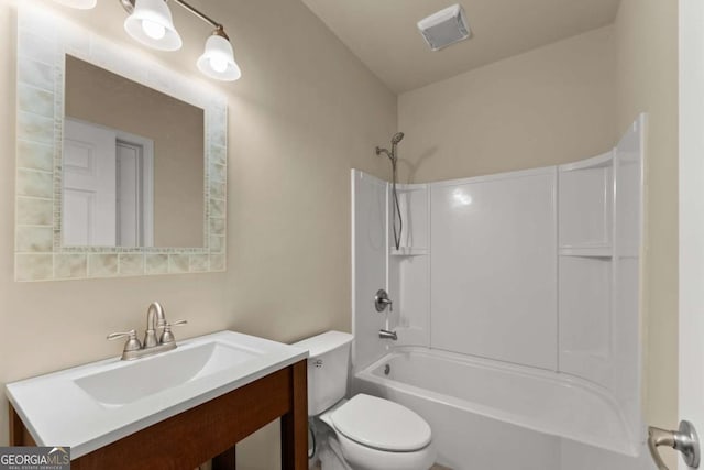 full bath featuring toilet, vanity, visible vents, and bathing tub / shower combination