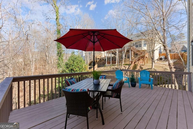 wooden deck featuring stairway