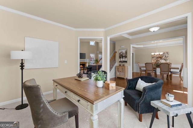 home office featuring baseboards, a notable chandelier, and crown molding