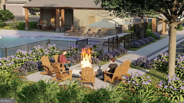 balcony featuring a fire pit and a patio