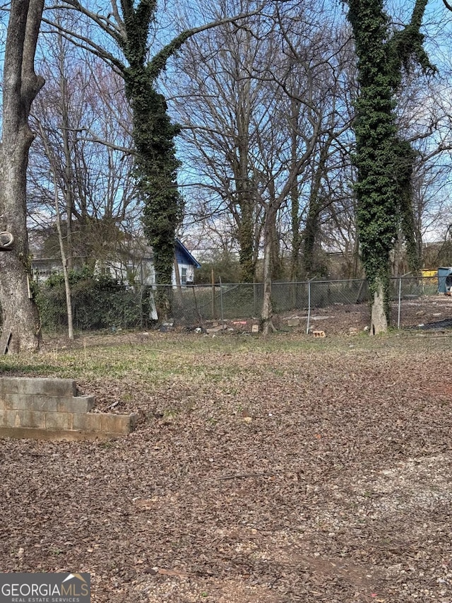 view of yard with fence