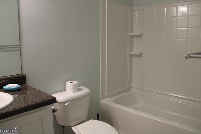 bathroom with toilet, shower / bathing tub combination, and vanity