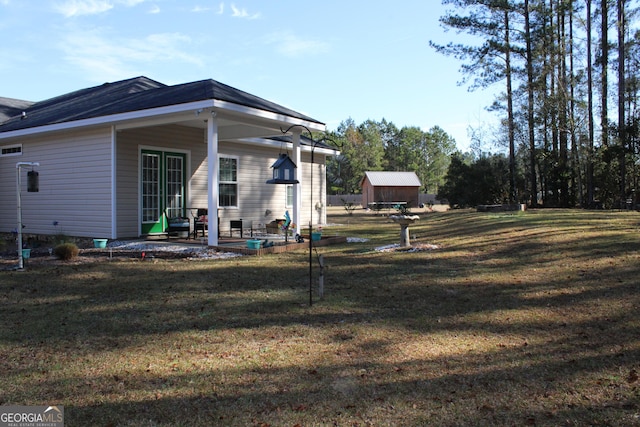 view of home's exterior featuring a patio area and a yard