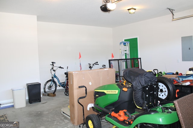 game room with a garage, electric panel, and unfinished concrete floors