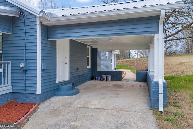 view of patio / terrace featuring an attached carport