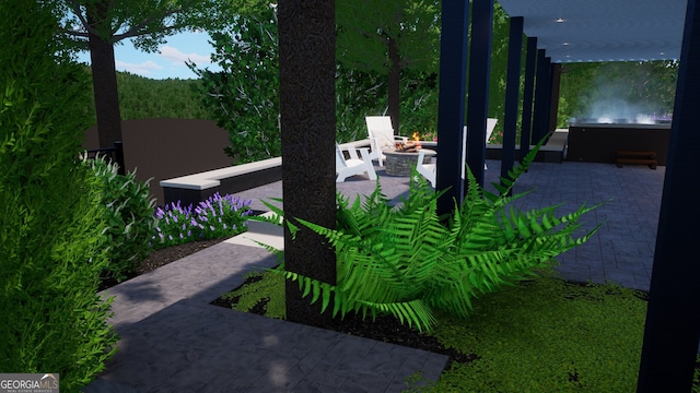 5390 Whiporwill Dr, Gainesville, GA 30504 - view of yard with an outdoor fire pit and a patio