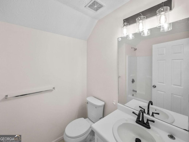 full bath with visible vents, lofted ceiling, toilet, a textured ceiling, and vanity