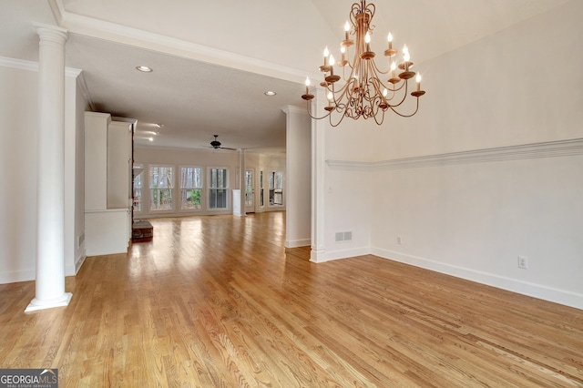 unfurnished dining area featuring ceiling fan, recessed lighting, light wood-style floors, baseboards, and ornate columns